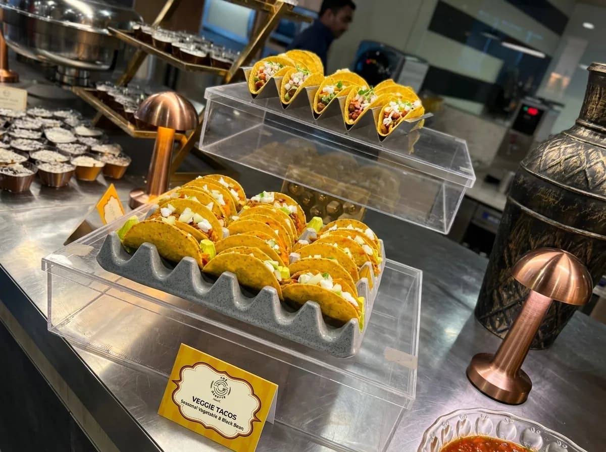 Wraps and rolls held in a covered display case at a grab-and-go service point