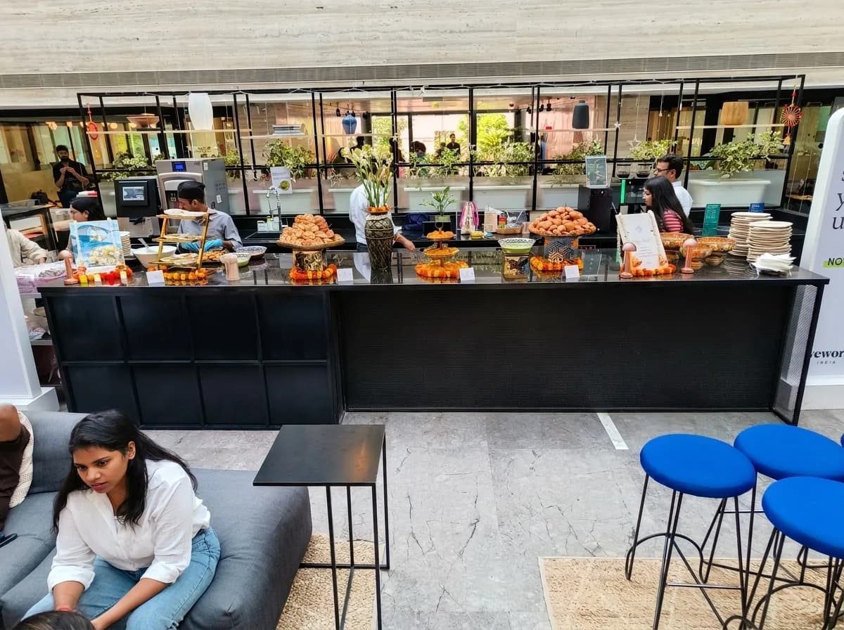 Lunch service laid out along the counter of an open-plan office cafeteria
